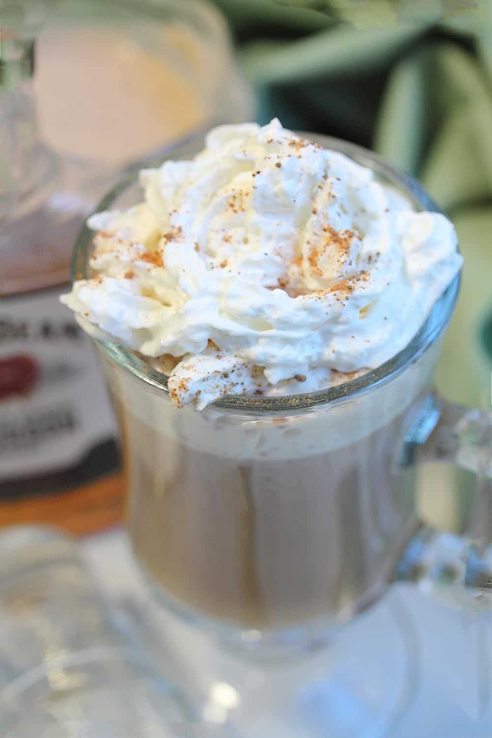 overhead shot of closeup of whipped cream topping with nutmeg