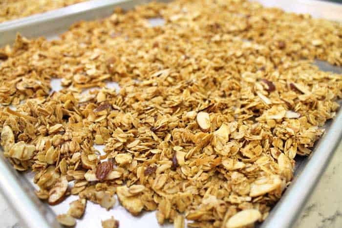 Fresh baked granola on cookie sheet.