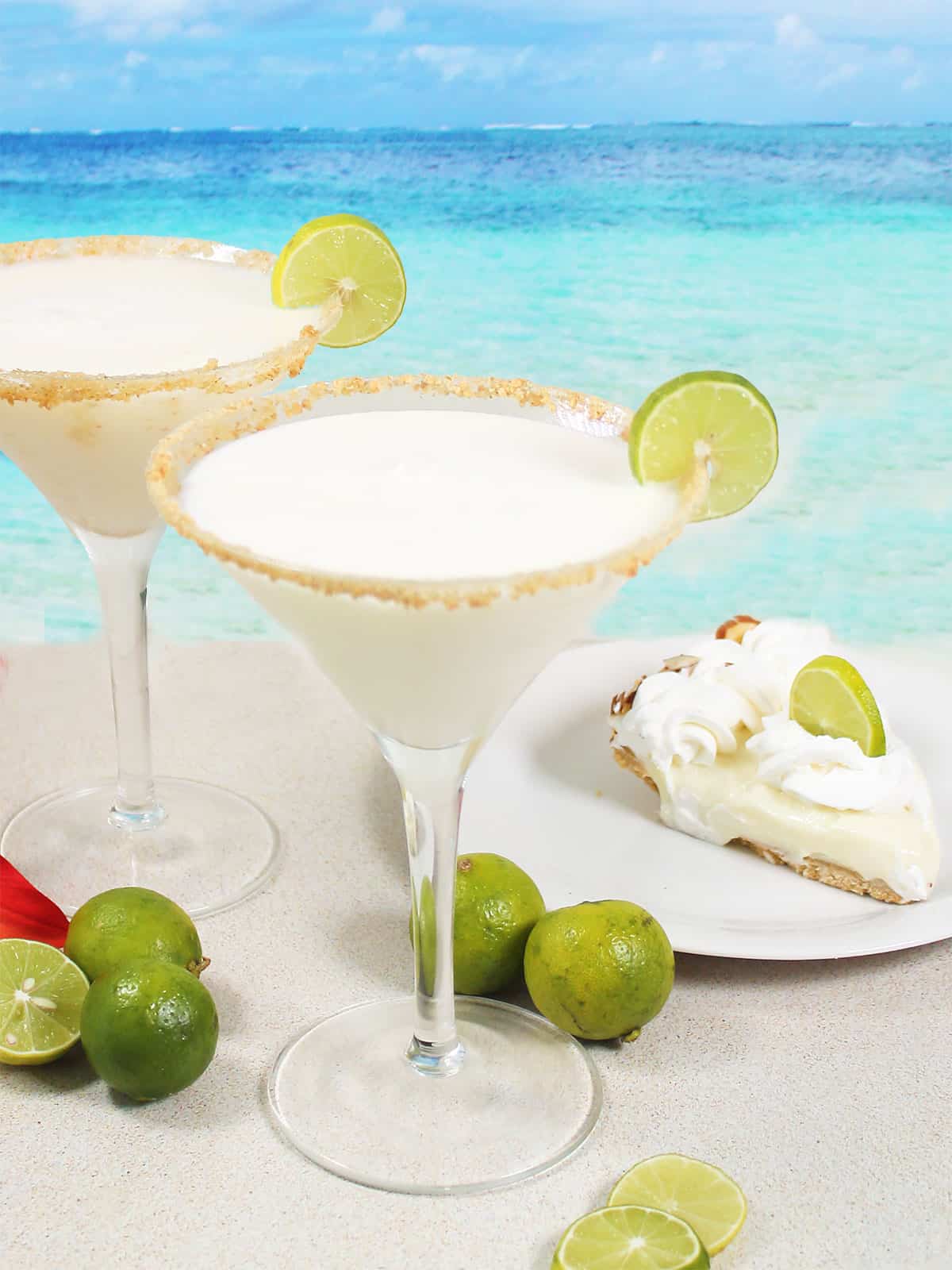 Two key lime martinis with key lime pie.
