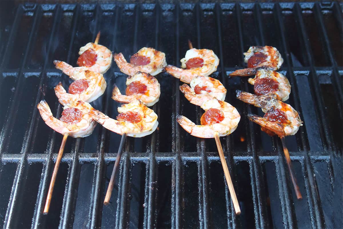 Grilling chorizo and shrimp.