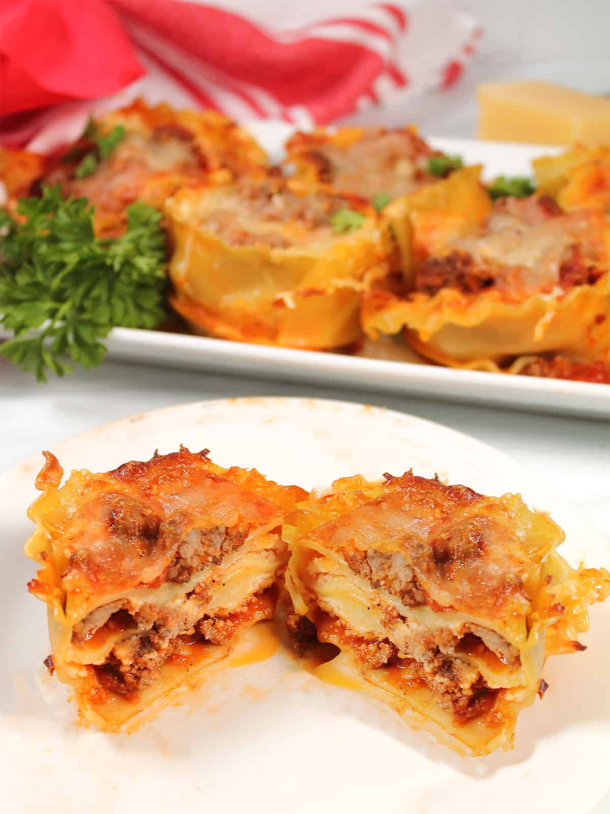 Halved lasagna cup showing layers.