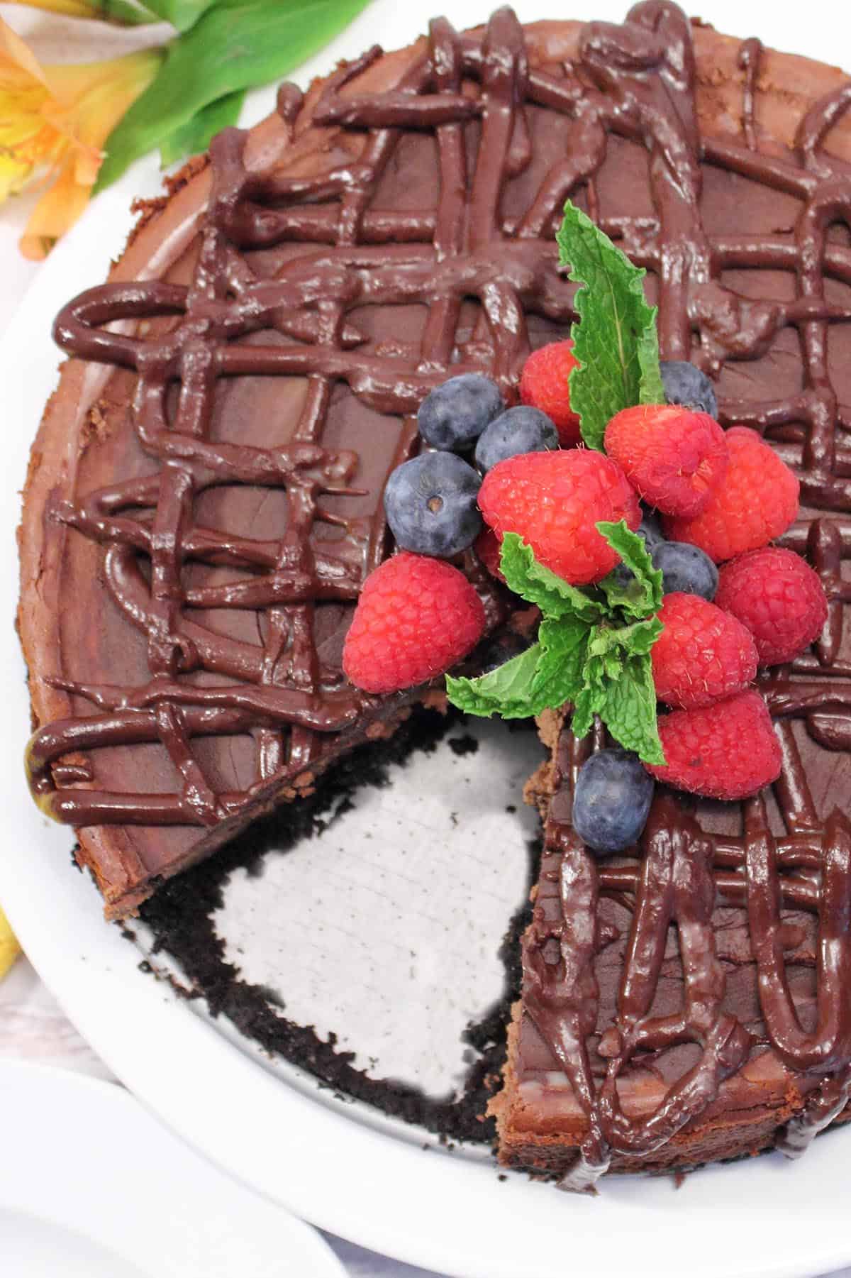 Overhead of cheesecake with slice removed.