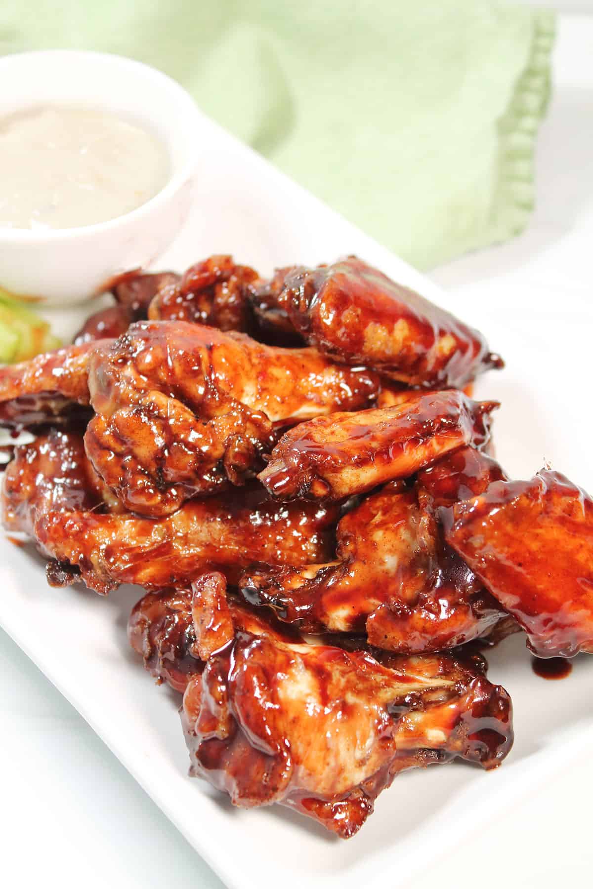Asian Baked Chicken Wings on platter with bleu cheese.