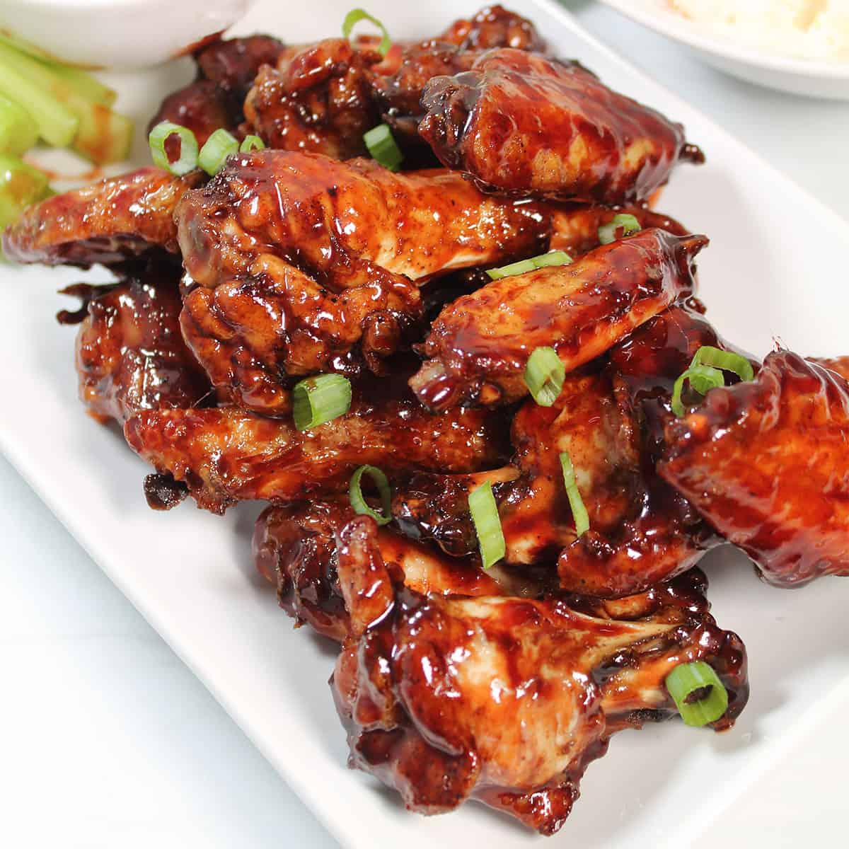 Closeup of Asian baked chicken wings.