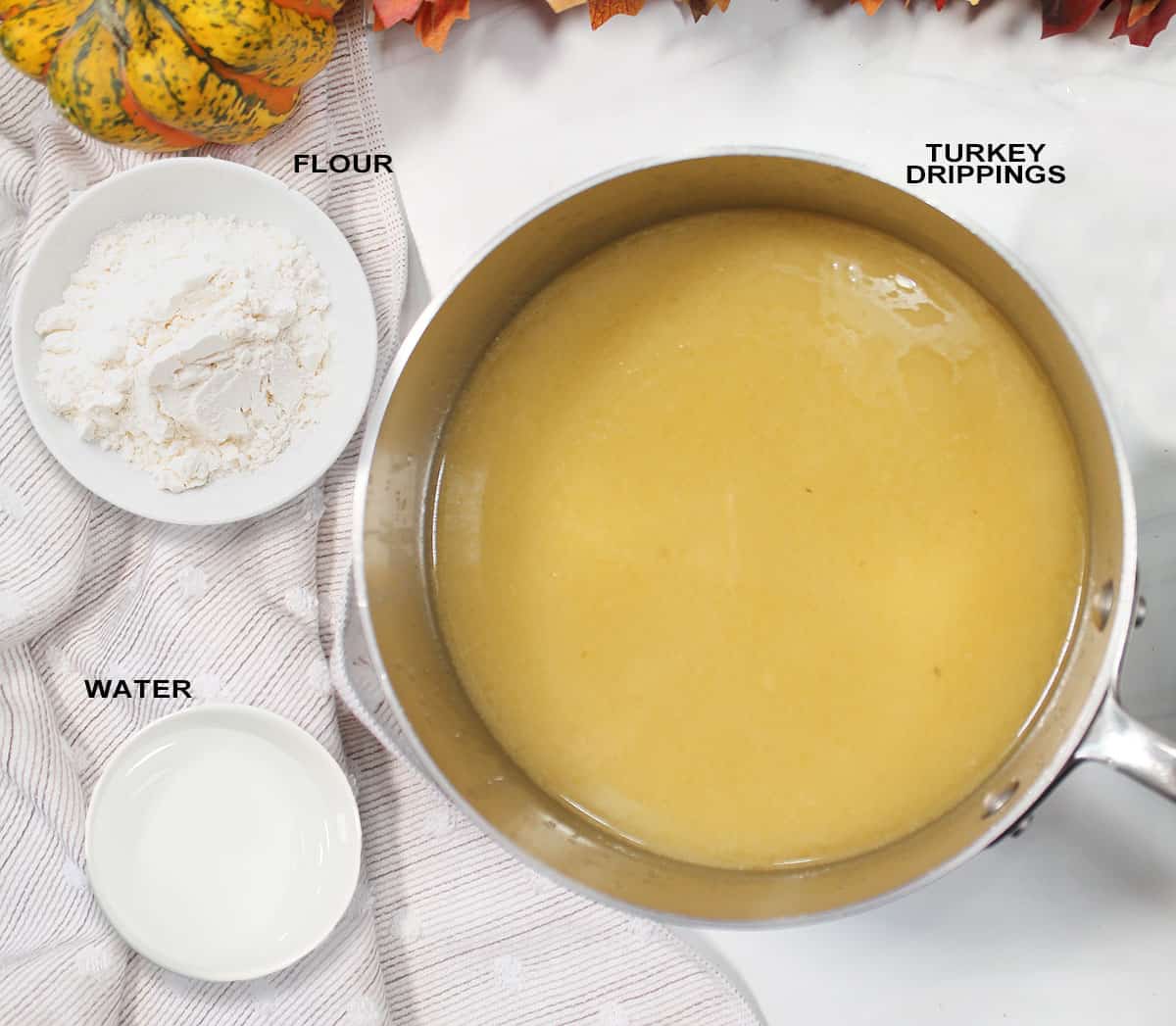 Gravy ingredients on white table.