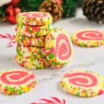 Stacked and scattered pinwheel cookies.