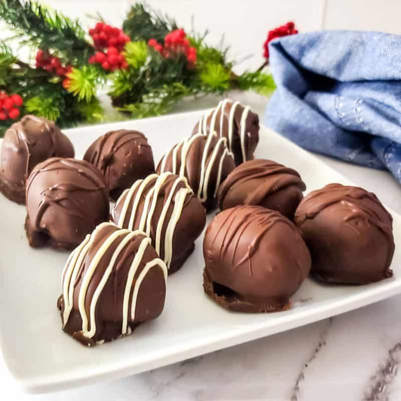 Truffles on a plate with blue towel in back.