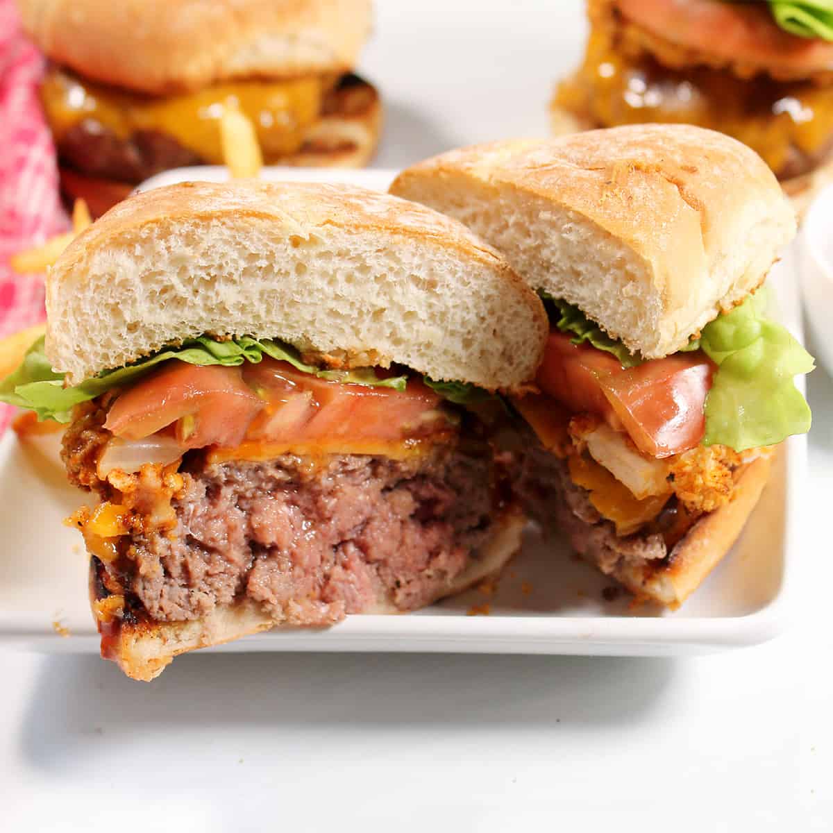 Halved burger showing how moist it is.