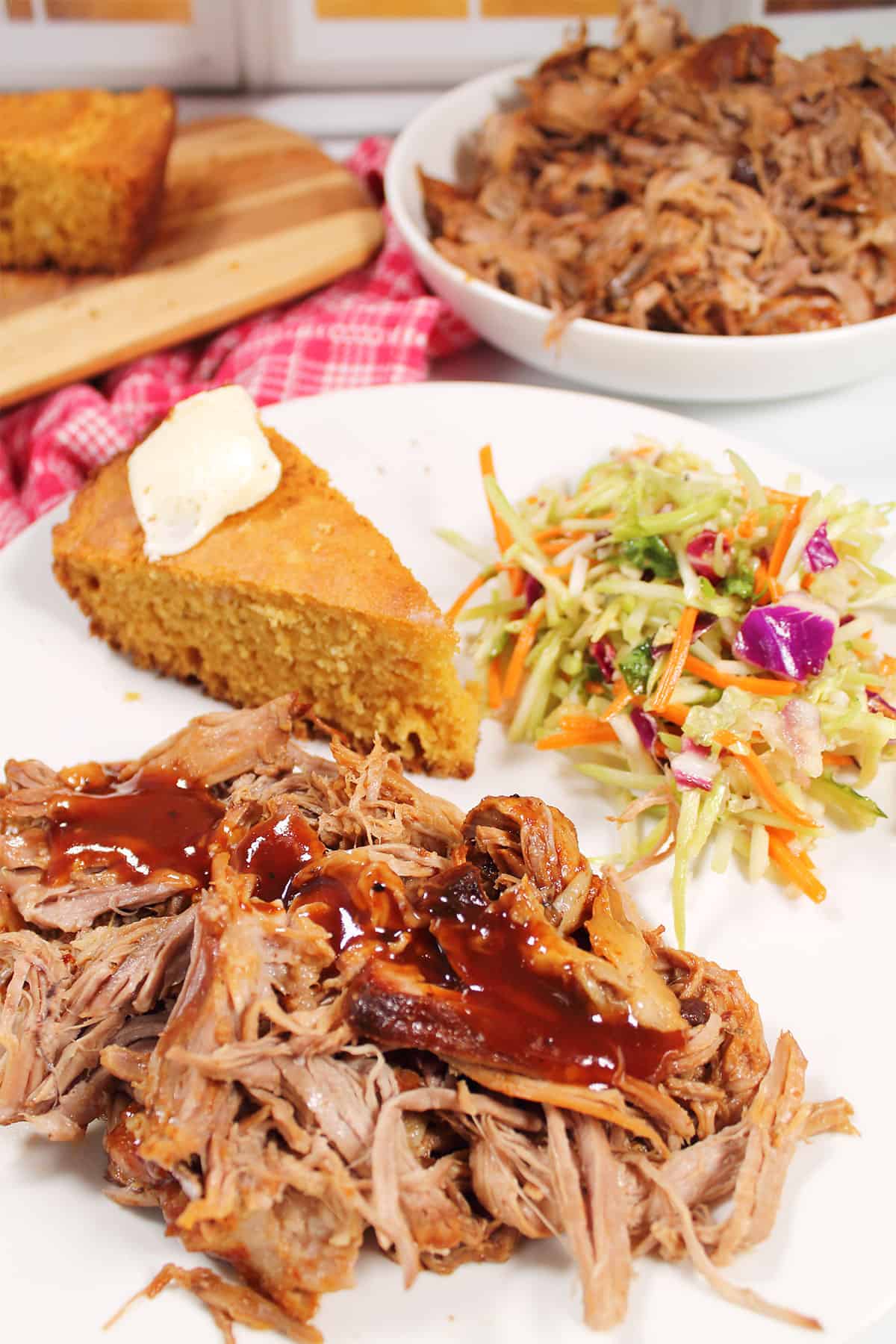 Plated dinner of crock pot BBQ pulled pork