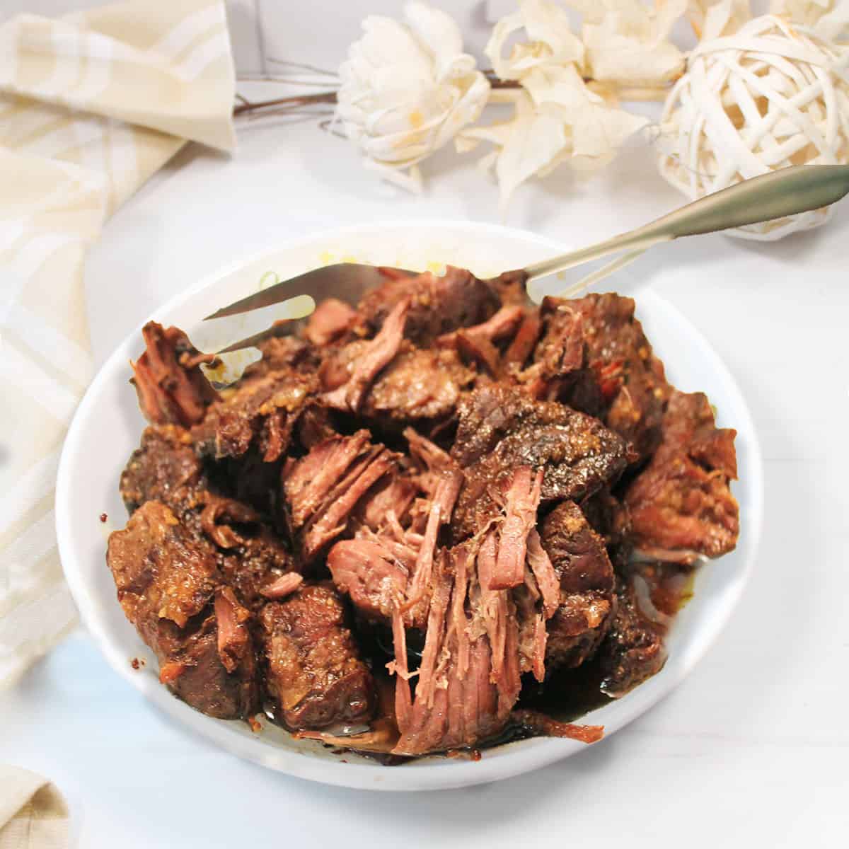 Bowl of slow cooker Hawaiian short ribs.