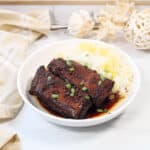 Beef short ribs with pineapple rice in bowl.