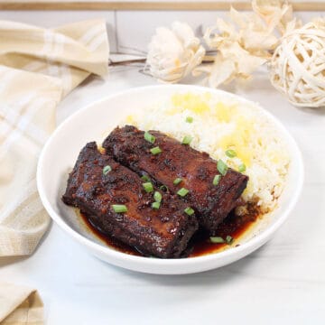 Beef short ribs with pineapple rice in bowl.
