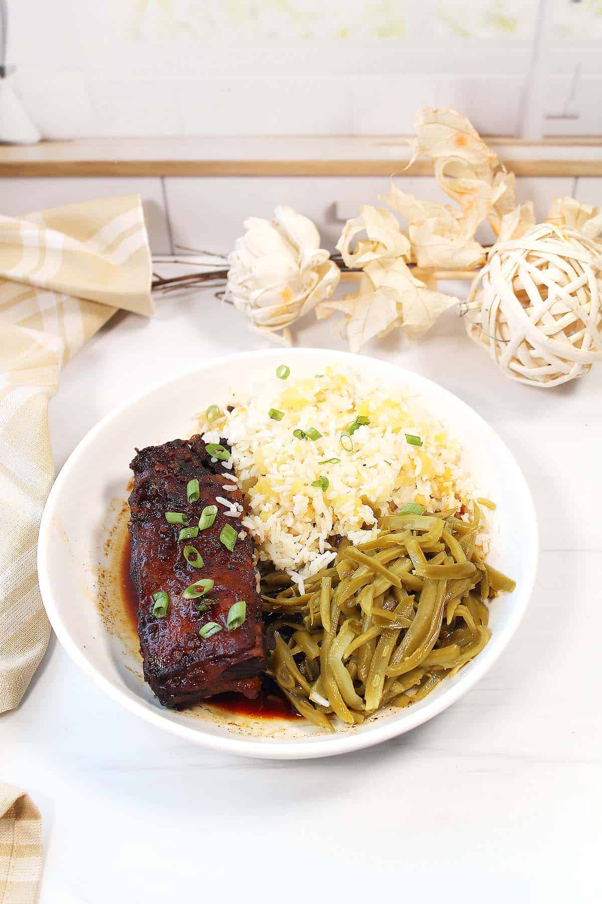 Crockpot short ribs with pineapple rice and green beans.