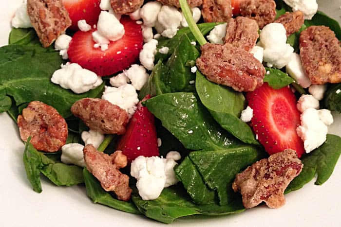 closeup of all ingredients in spinach salad