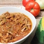 Cola pork in white serving bowl.