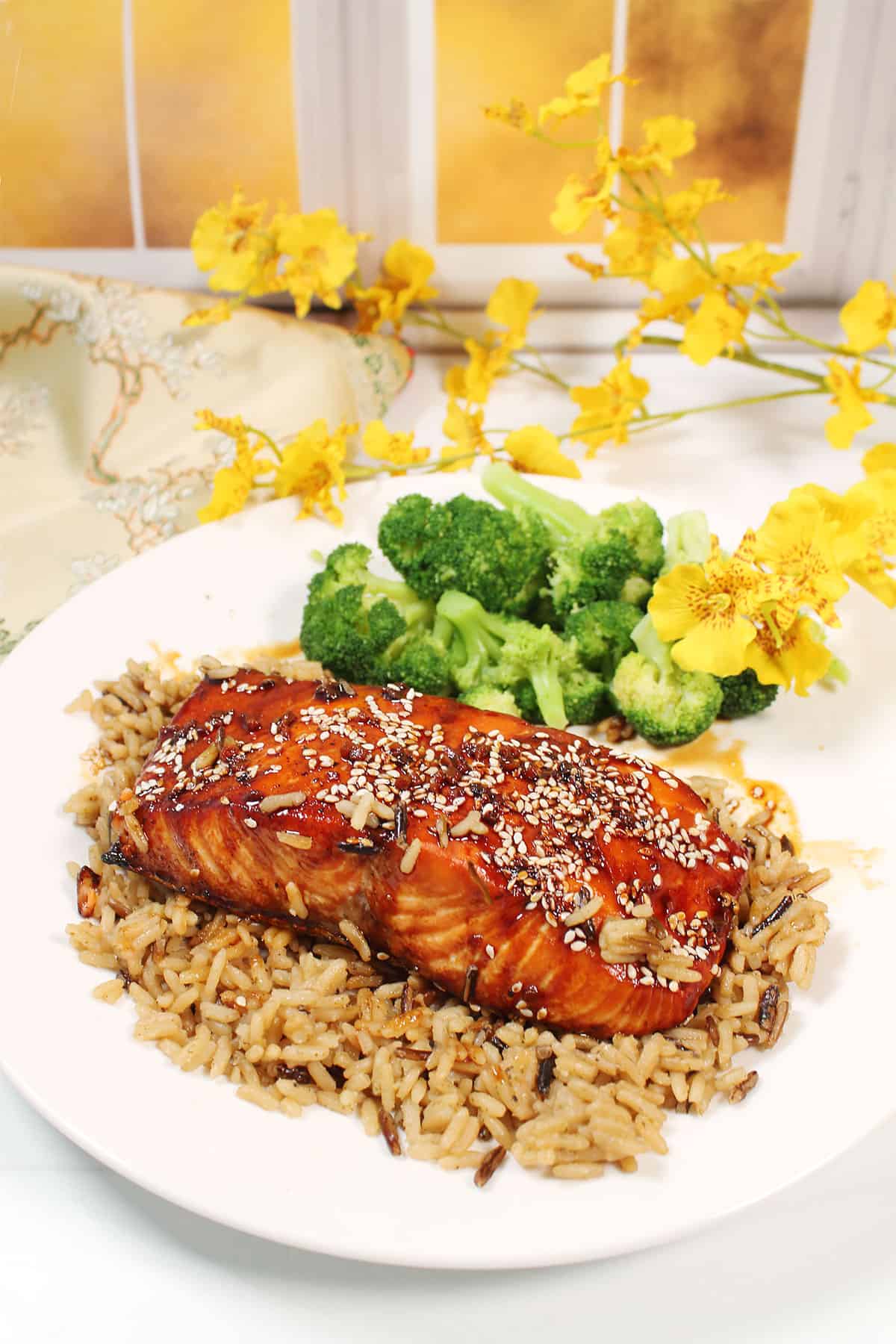 Plated dinner of honey soy glazed salmon.
