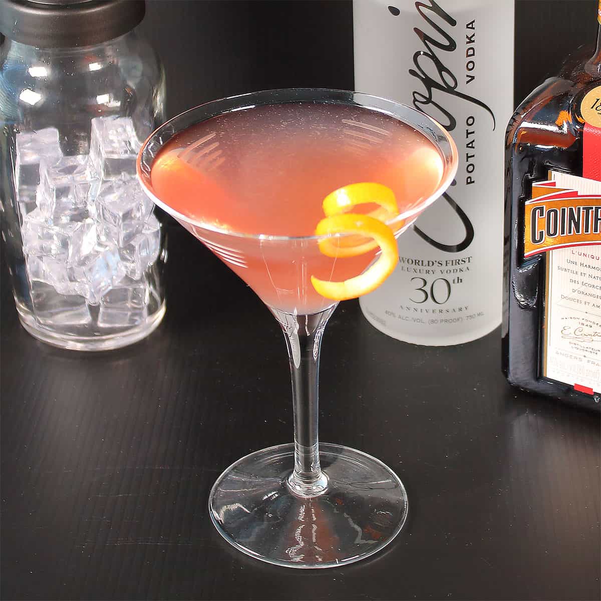 Cosmopolitan cocktail with orange twist.