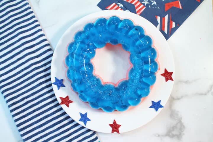 Jello unmolded onto white platter.