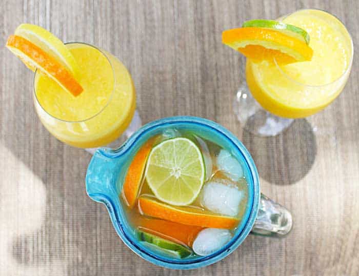 Sunshine Sangria garnishes of sliced fruit