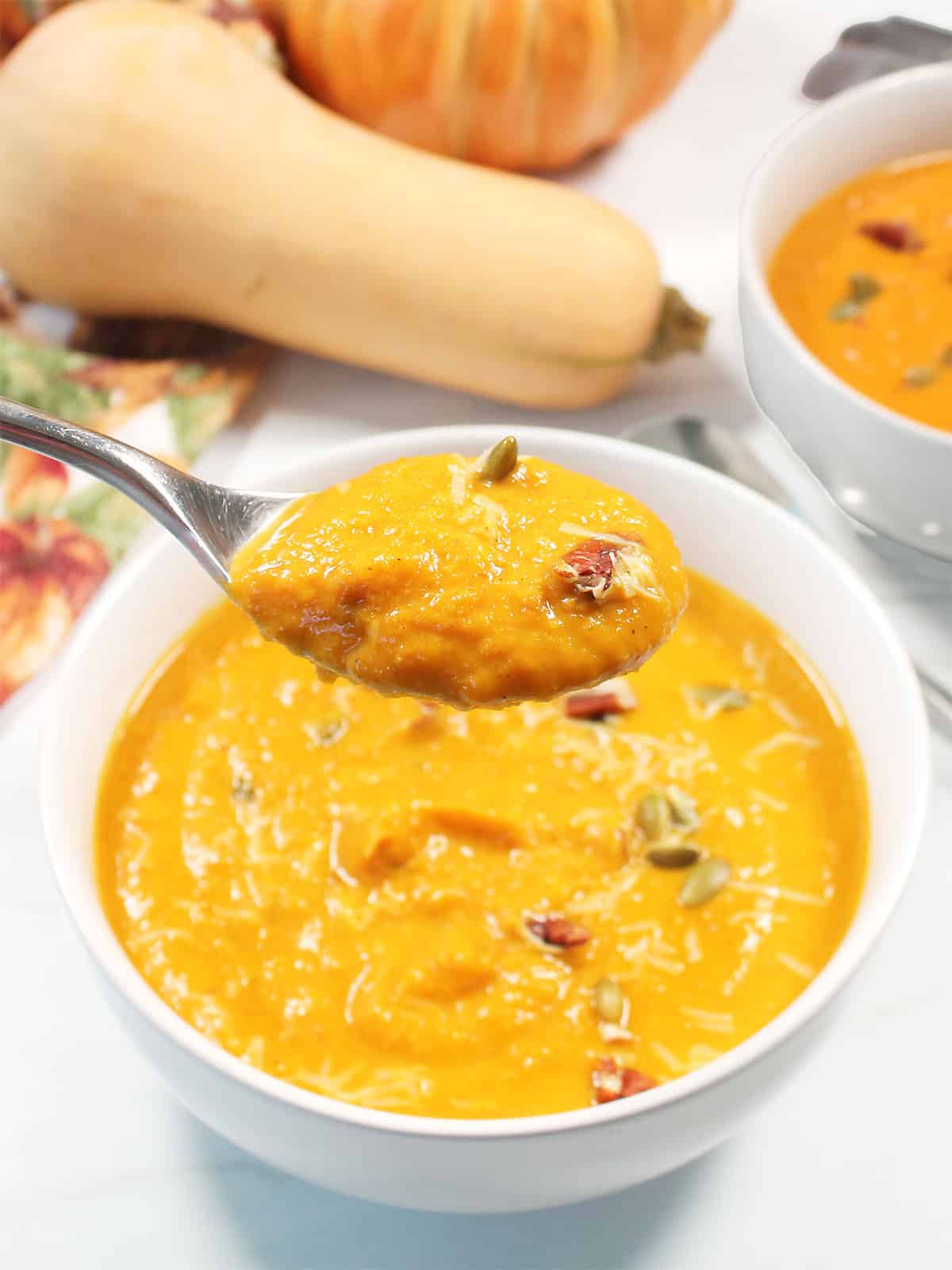 Closeup of spoonful of soup.