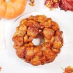 Baked Pumpkin Spice Monkey Bread inverted on plate.