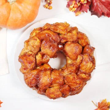 Baked Pumpkin Spice Monkey Bread inverted on plate.