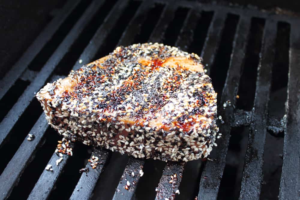 Seared tuna on hot grill.