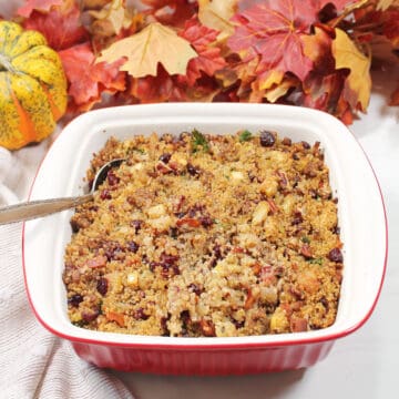 Baked gluten-free stuffing with spoon.