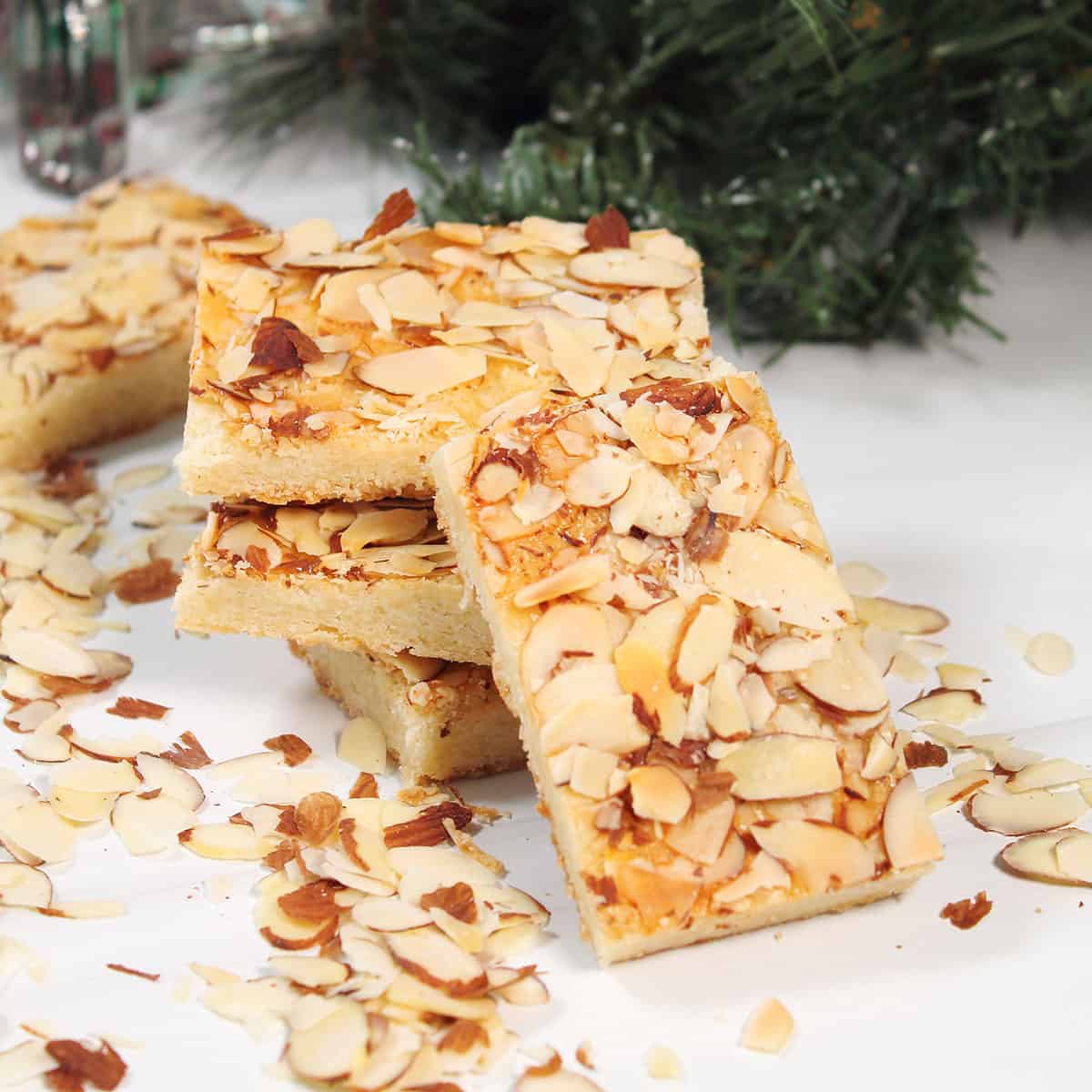 Almond Bars stacked with one leaning.
