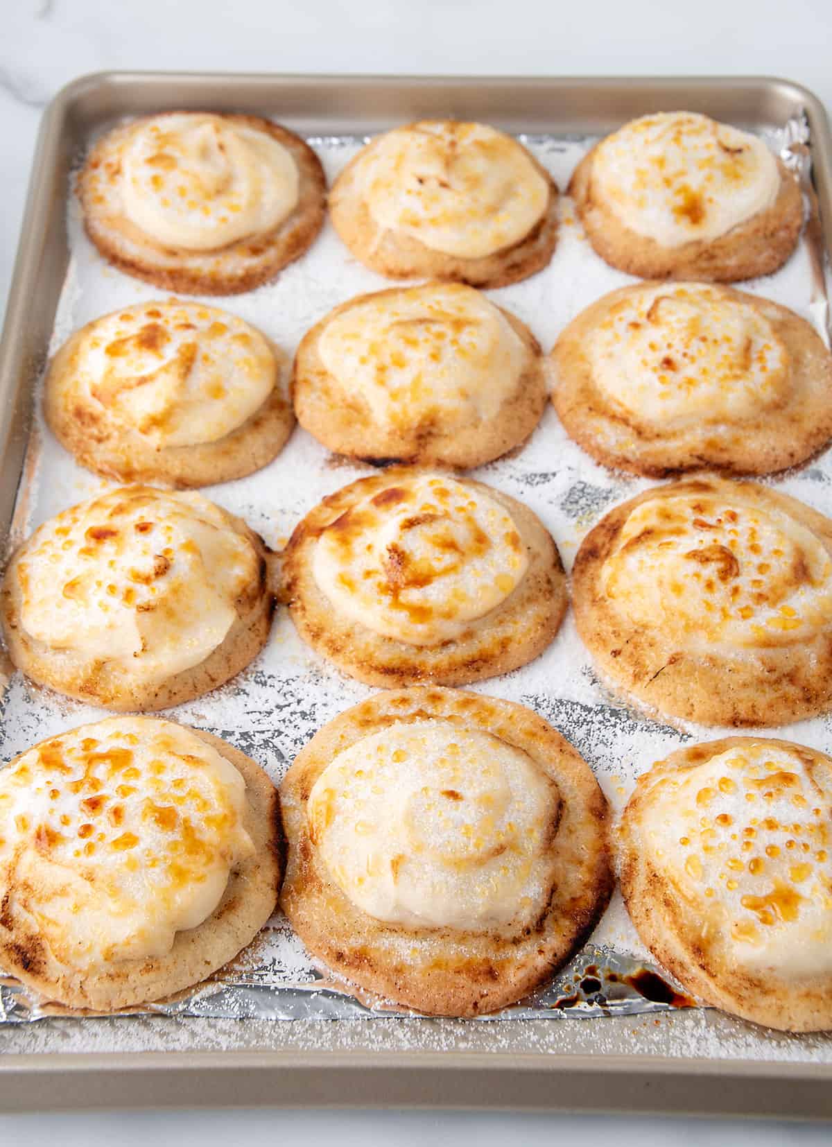 Cookies on cookie sheet after making creme brulee crunchy topping.