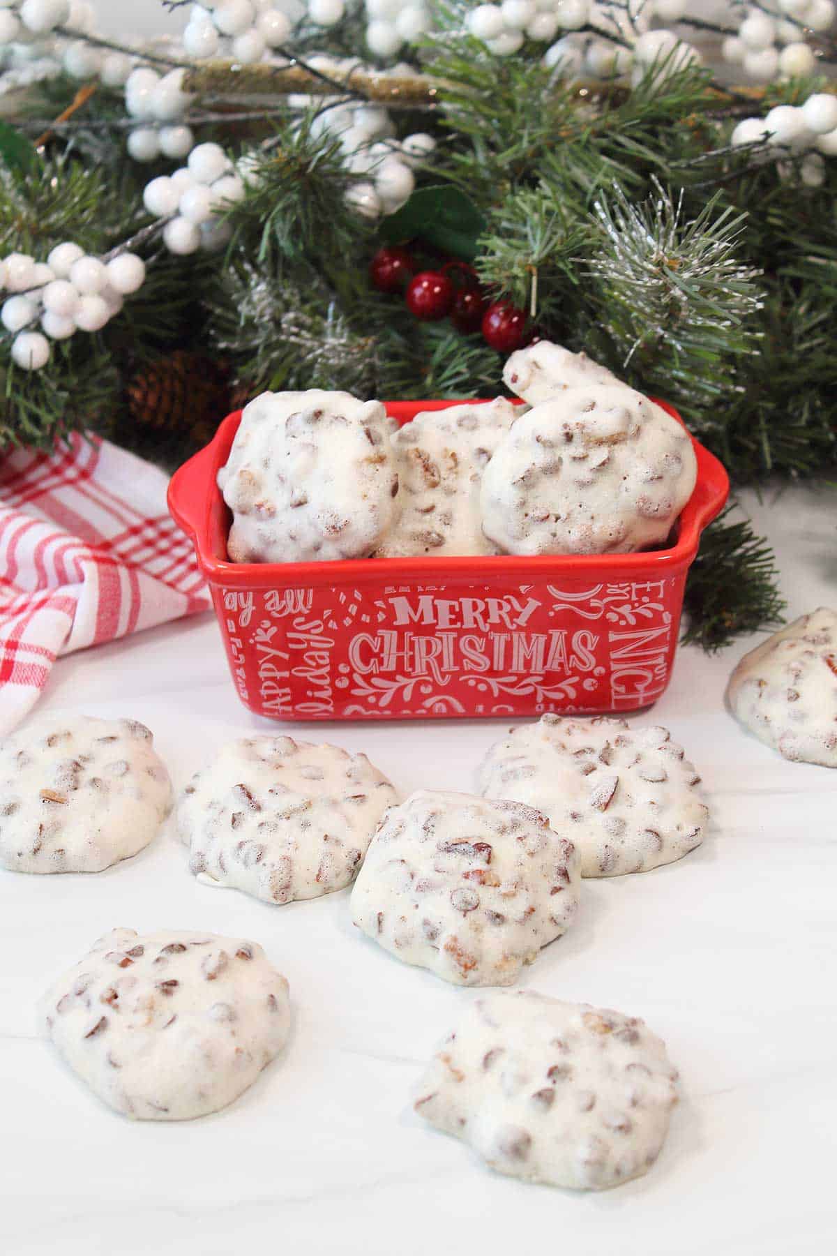 Egg white cookies in Merry Christmas dish for holidays.