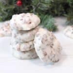 Stacked Forgotten cookies with one leaning.