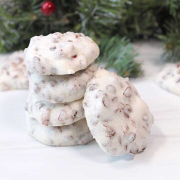Stacked Forgotten cookies with one leaning.