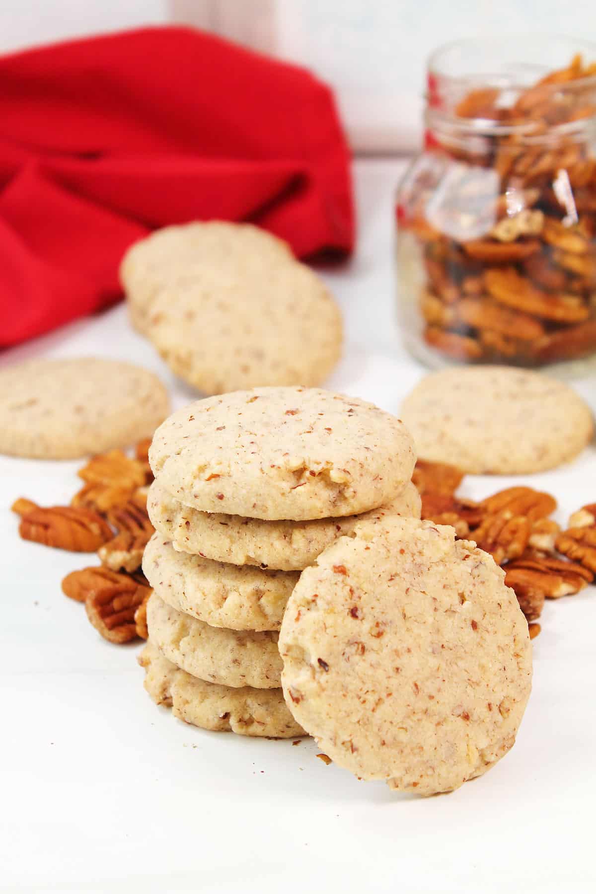 Stack of Pecan Sandies with one leaning on stack.