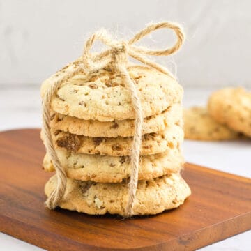 Special K cookies tied with twine on wooden board.