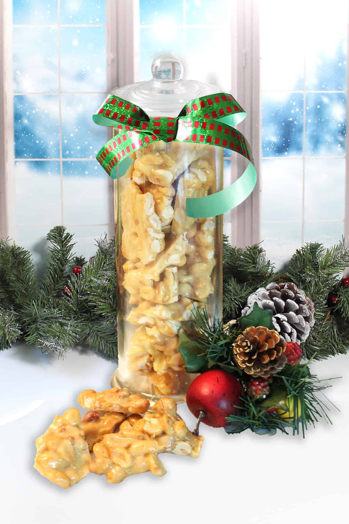 Peanut Brittle gift wrapped in a tall jar.