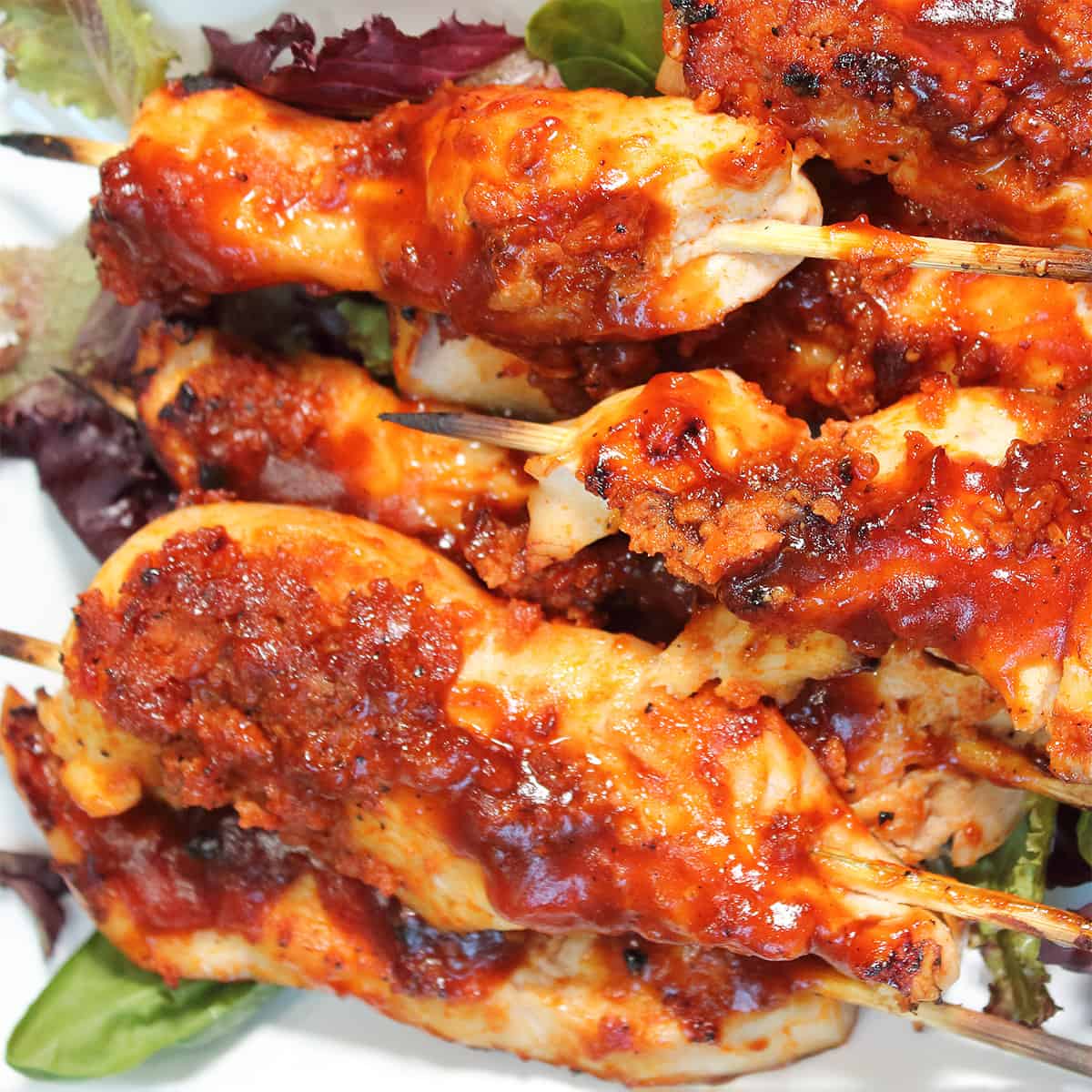 Closeup of Bourbon BBQ Sauce covered chicken kabobs.