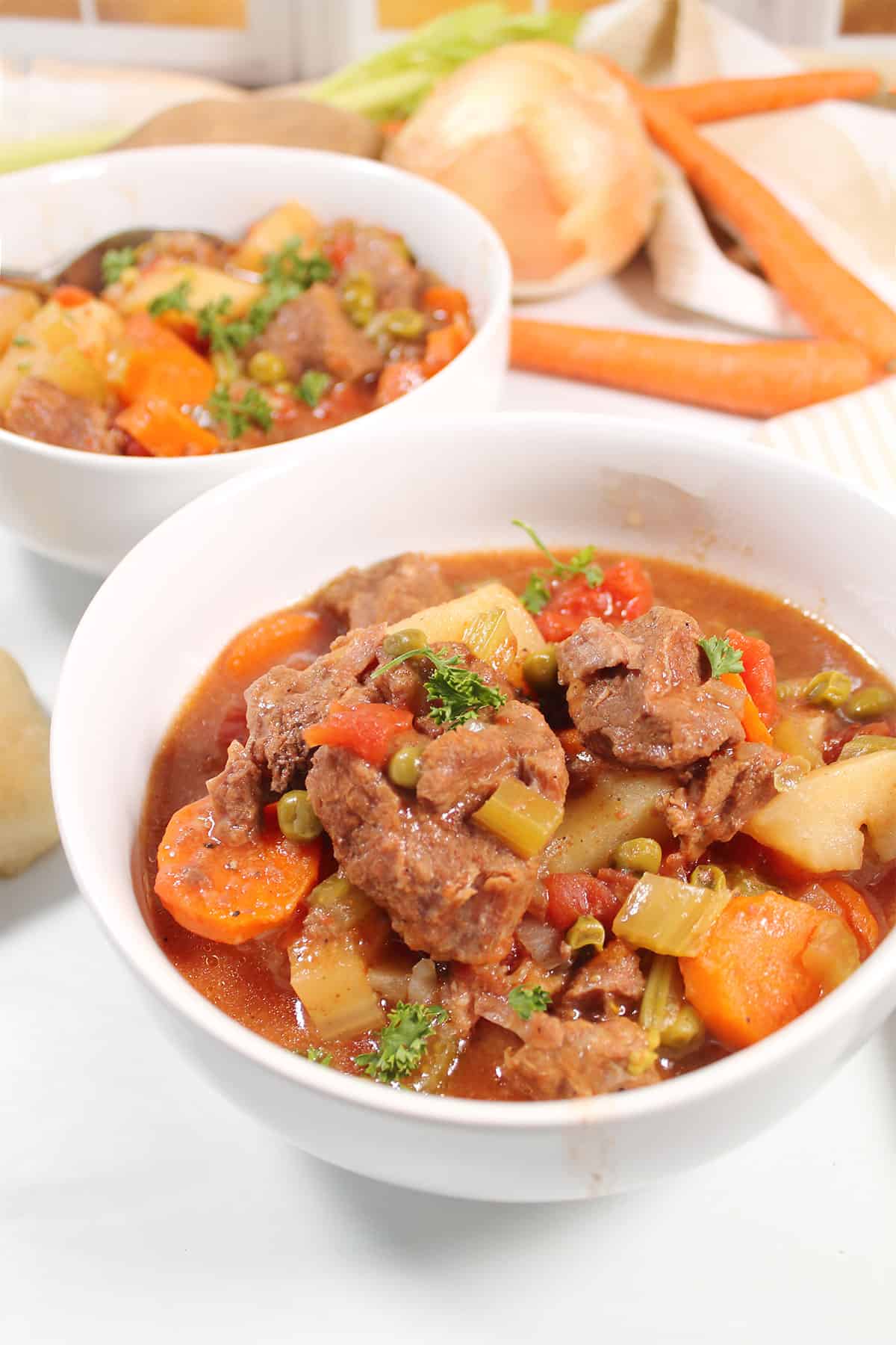 Two bowls of crock pot old fashioned beef stew.