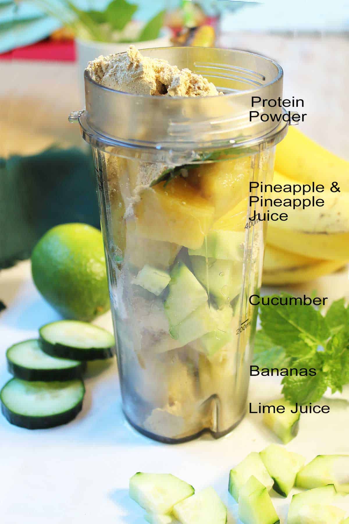 Layered ingredients in blender cup.