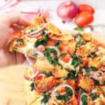 Closeup of slice of pizza.