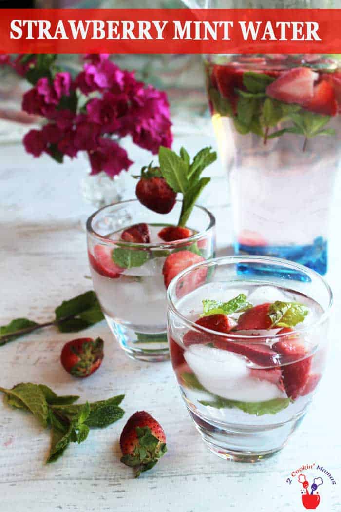 Strawberry Mint Water | 2 Cookin Mamas Getting the right amount of water a day doesn't have to be hard, especially with this deliciously sweet strawberry mint water. It's easy to make and tasty too. All it takes are fresh strawberries, a few mint leaves and some water. So refreshing! #water #flavoredwater #beverage #summerbeverage #strawberries
