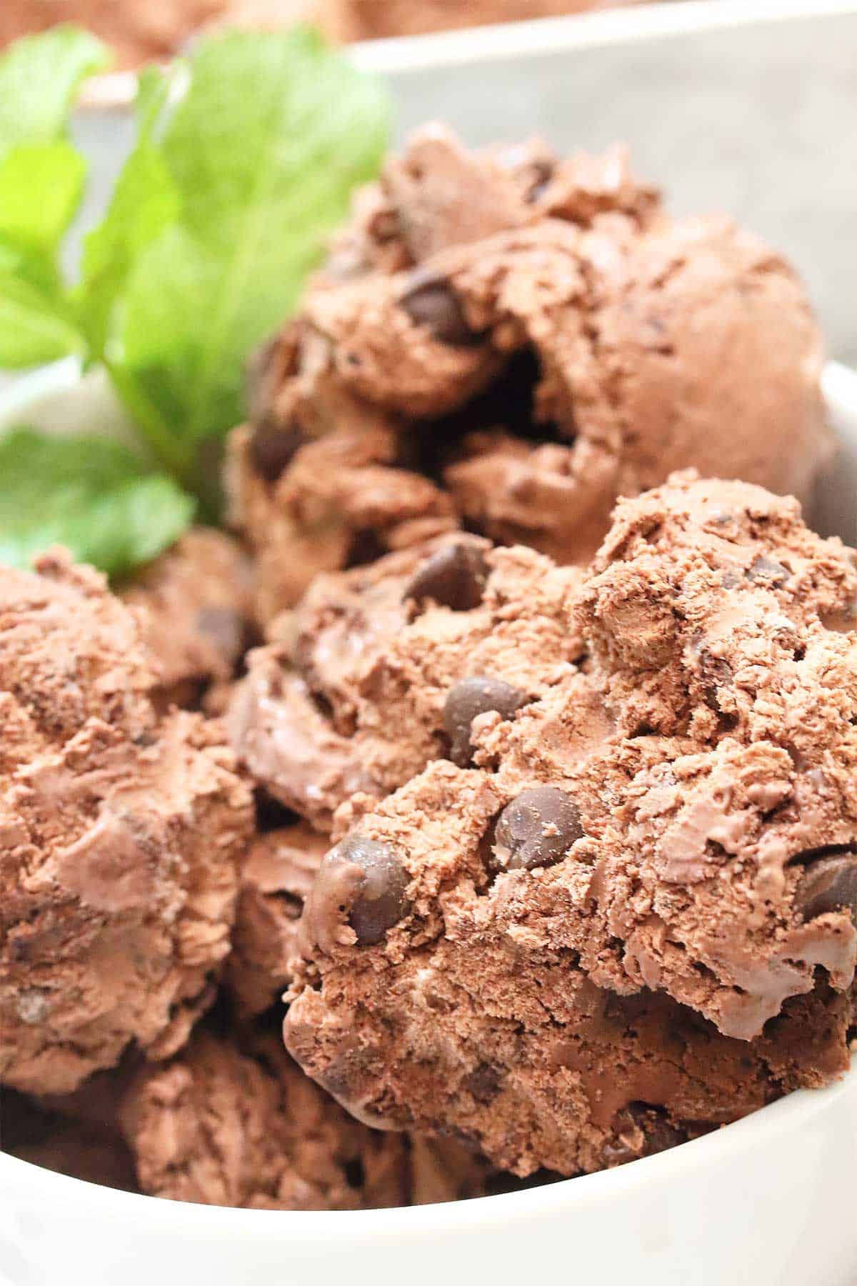 Extreme closeup of partial bowl of ice cream.