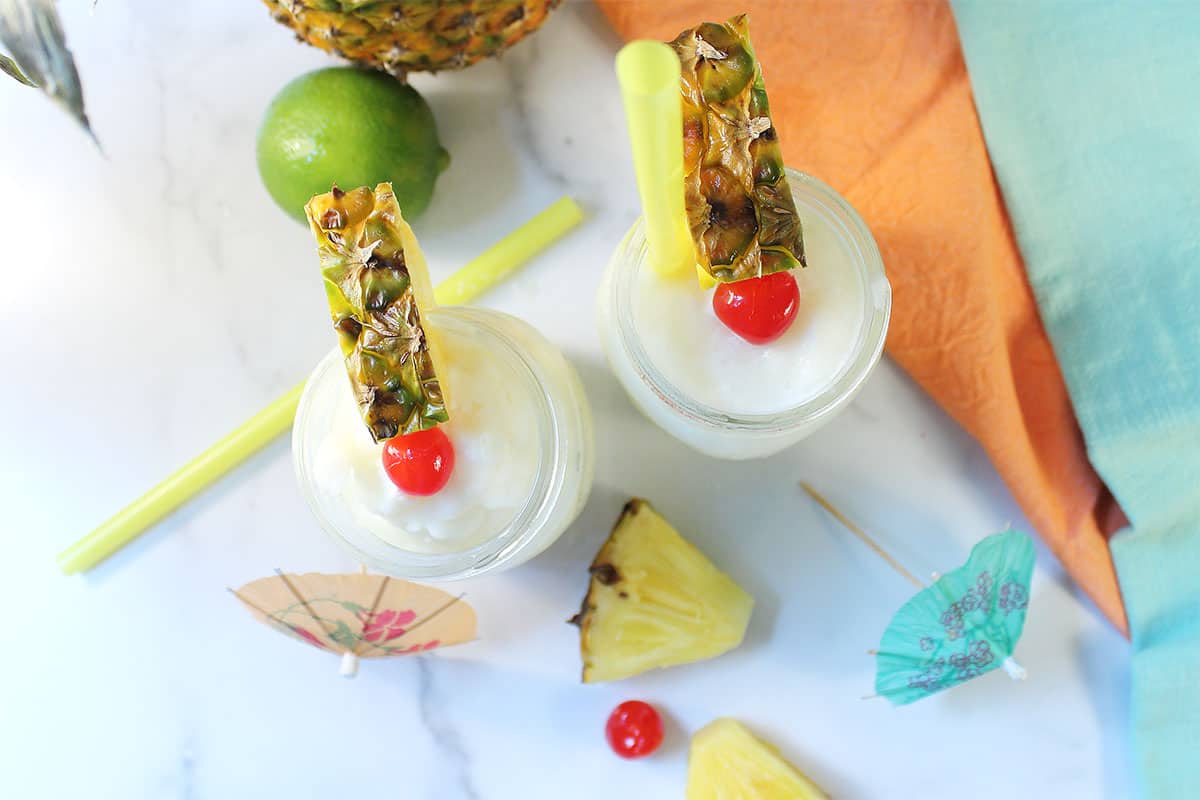 Two garnished cocktails.