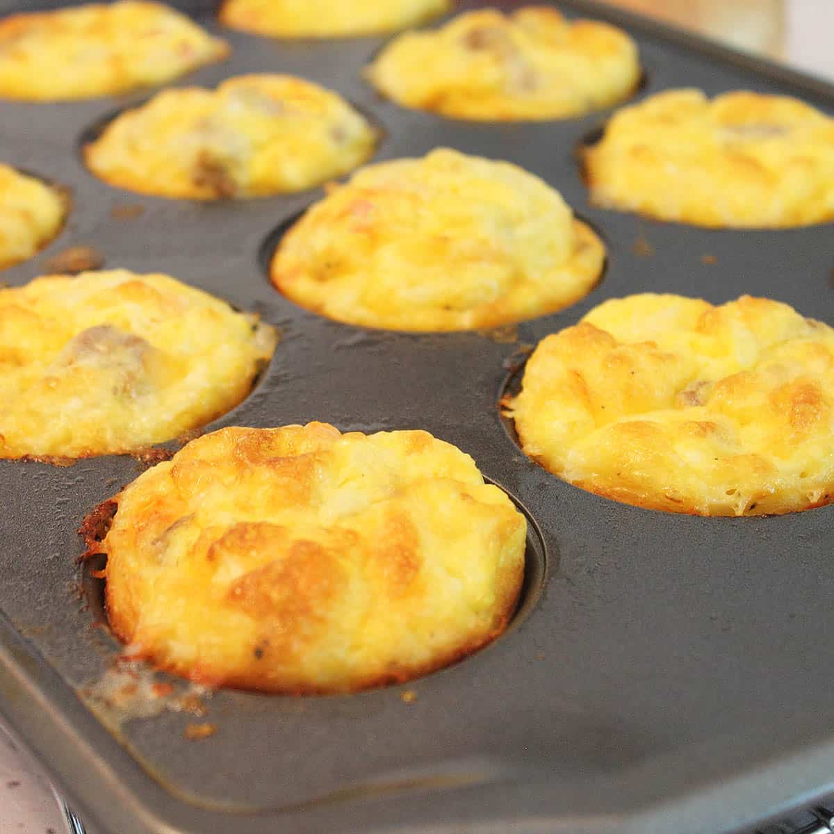 Browned egg muffins closeup in muffin tin.