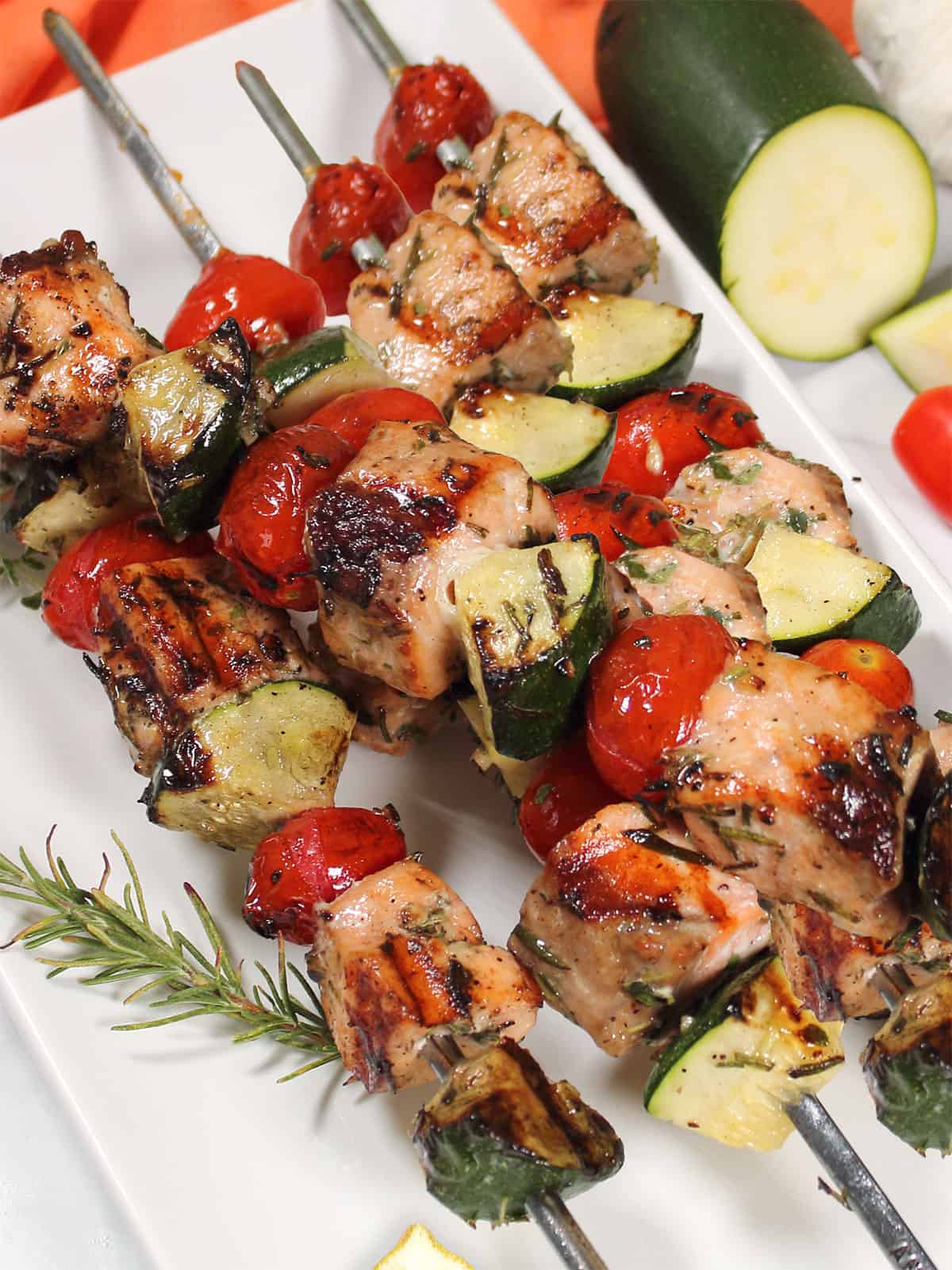Closeup of salmon kabobs hot off the grill.
