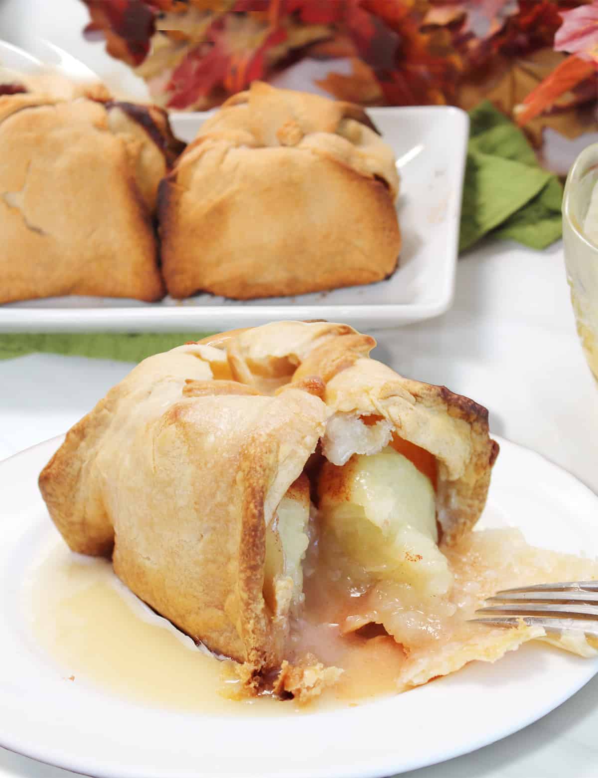 Inside of apple dumpling with pie crust.