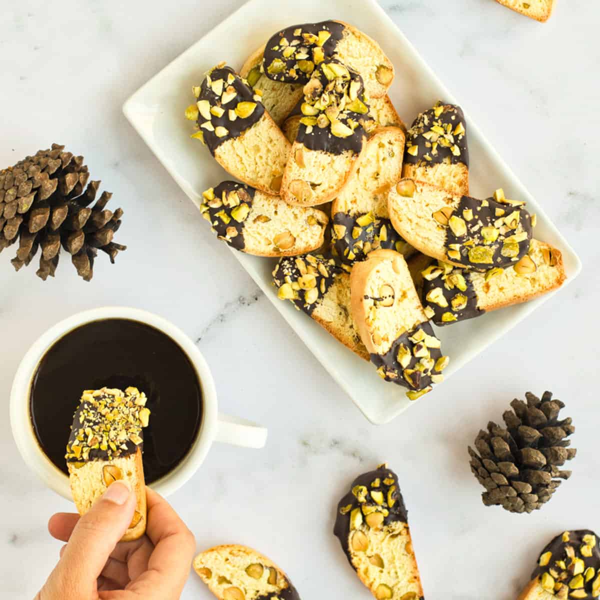 Dipping biscotti in coffee.