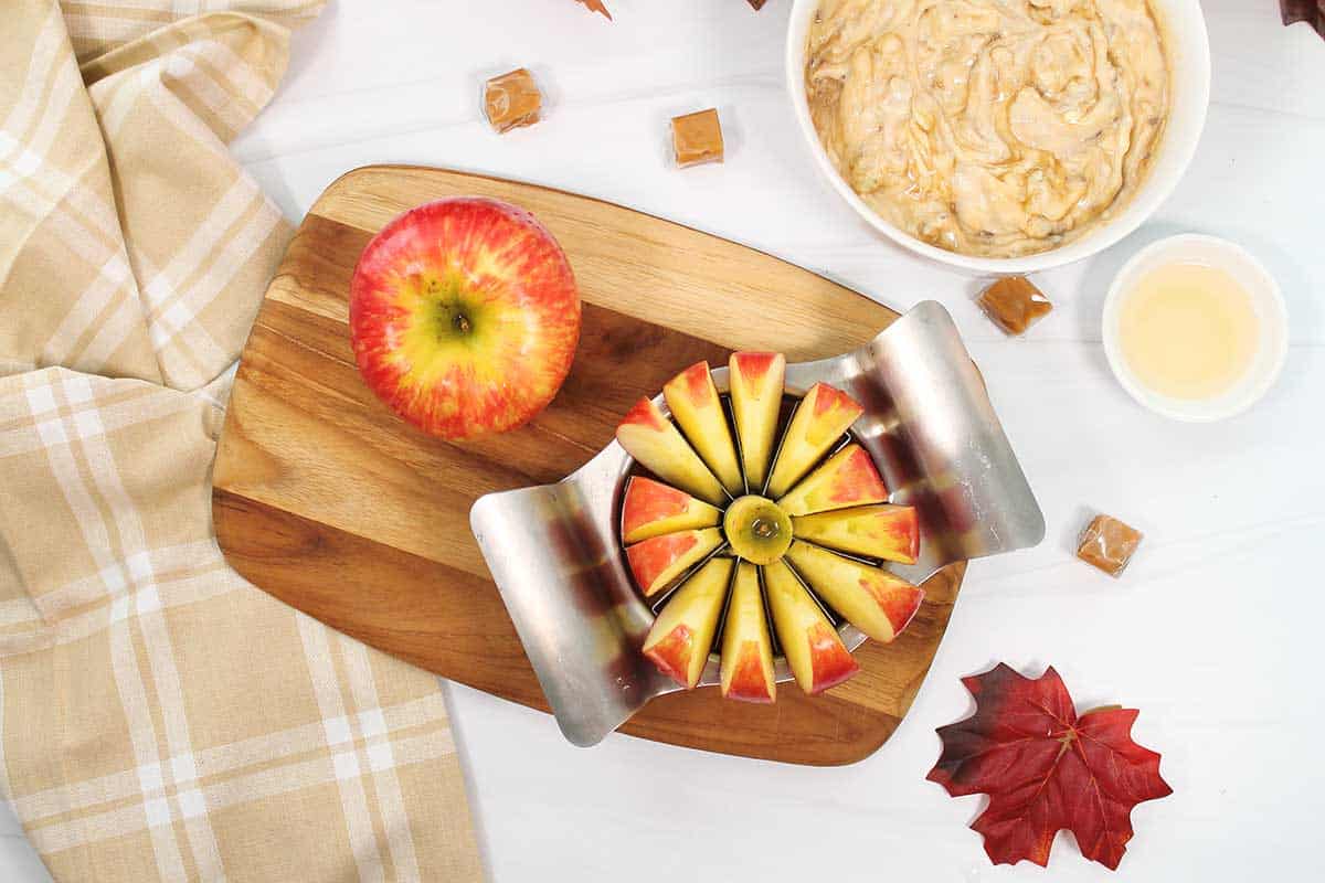 Cutting the apples to serve with toffee apple dip.