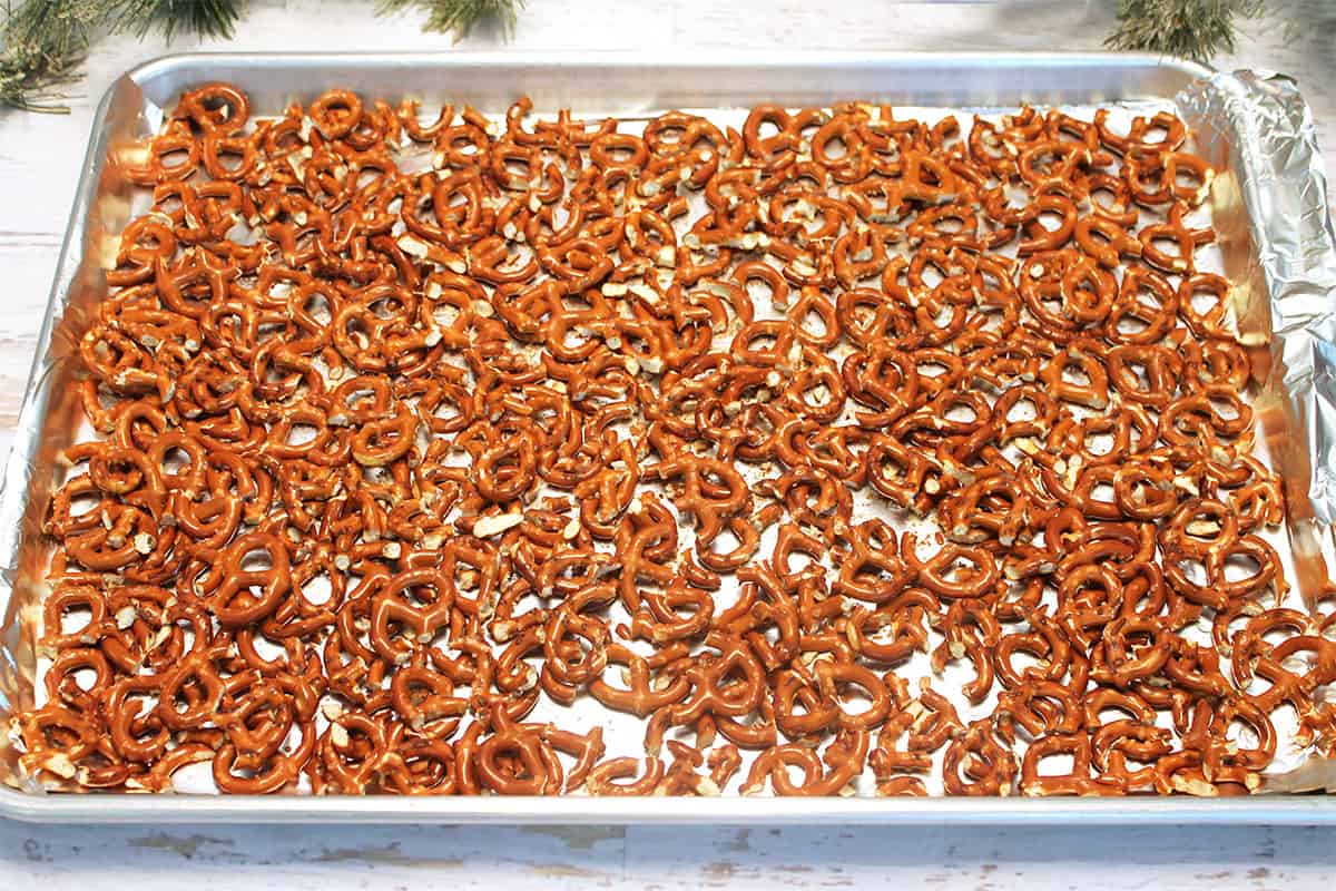 Layer of pretzels on baking sheet.