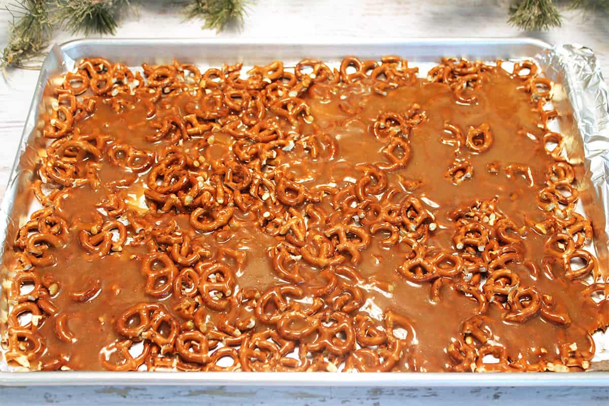 Toffee layer spread over pretzels.